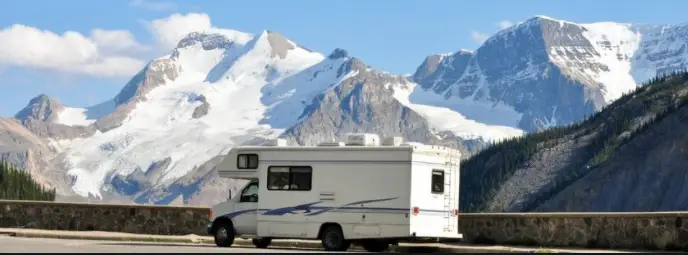 rv near big snowy mountains